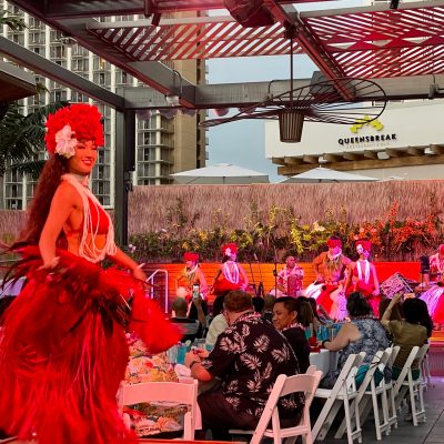 a group of people standing in front of a building
