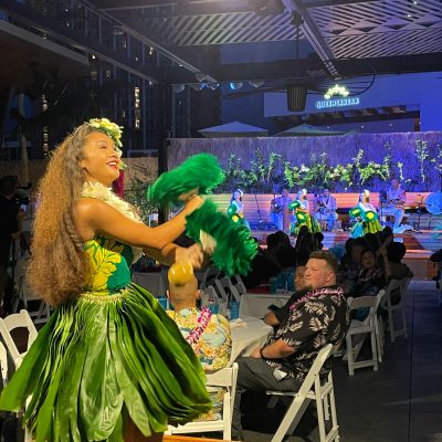a woman standing in front of a store