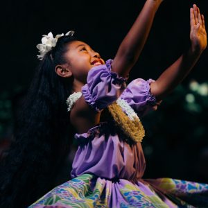 a little girl posing for a picture