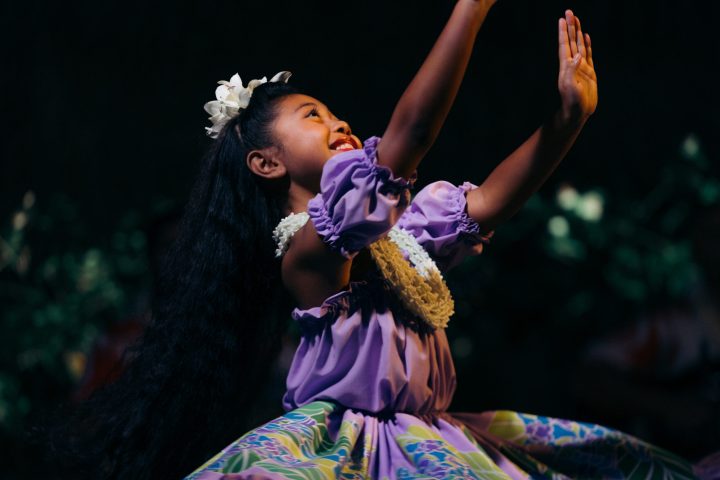 a little girl posing for a picture